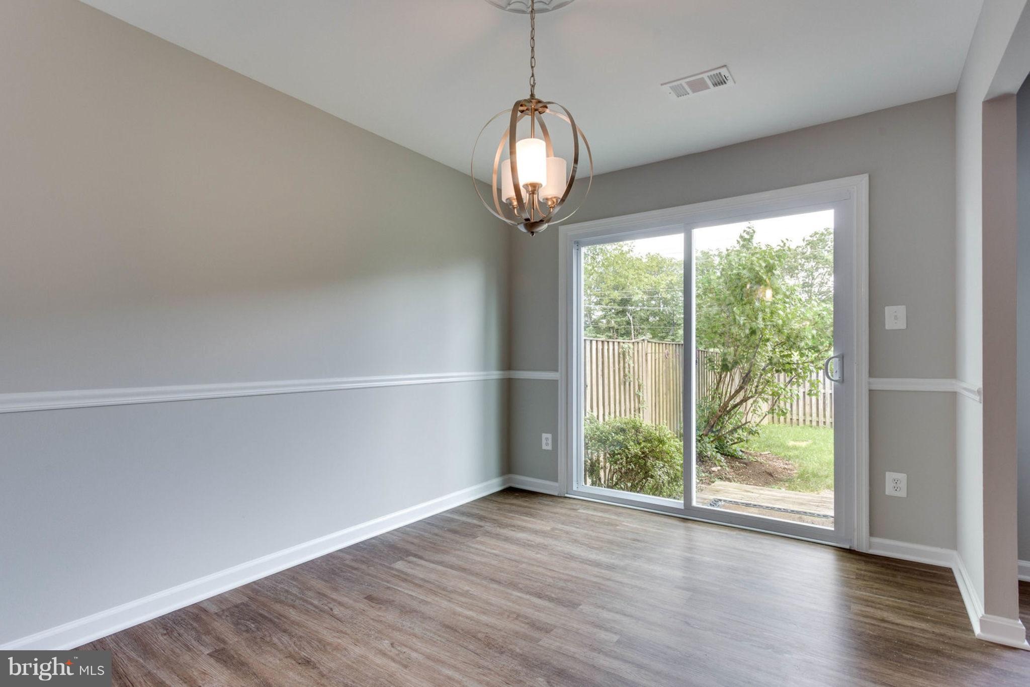 7764 Euclid Way Springfield, VA 22153 - Photo 7 of 18 Dining Room walks out to fenced yard