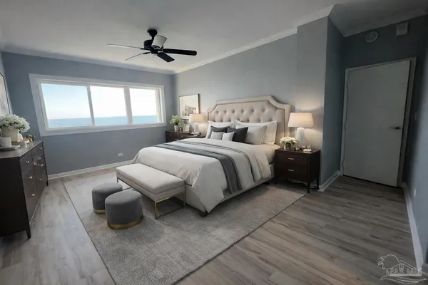 a bedroom with a bed and a ceiling fan