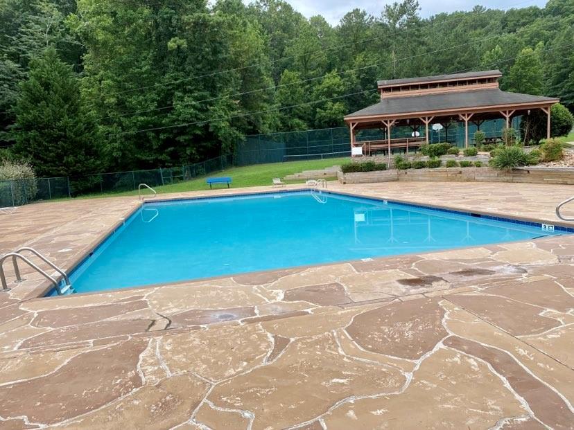 562 Neptune Circle Northeast Ranger, GA 30734 - Photo 16 of 23 a view of a swimming pool with a patio