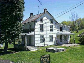 470 Andersontown Road Dover, PA 17315 - Photo 1 of 1 a front view of a house with a yard
