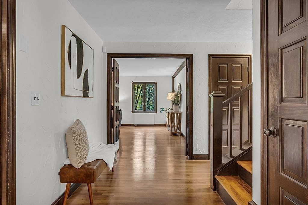 3 Peninsula Road Harvard, MA 01451 - Photo 12 of 42 a view of a hallway to a livingroom with furniture