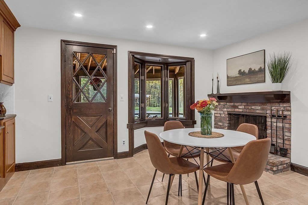 3 Peninsula Road Harvard, MA 01451 - Photo 18 of 42 a view of a dining room with furniture window and wooden floor
