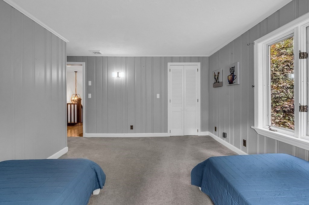 3 Peninsula Road Harvard, MA 01451 - Photo 27 of 42 a view of a livingroom with wooden floor and windows