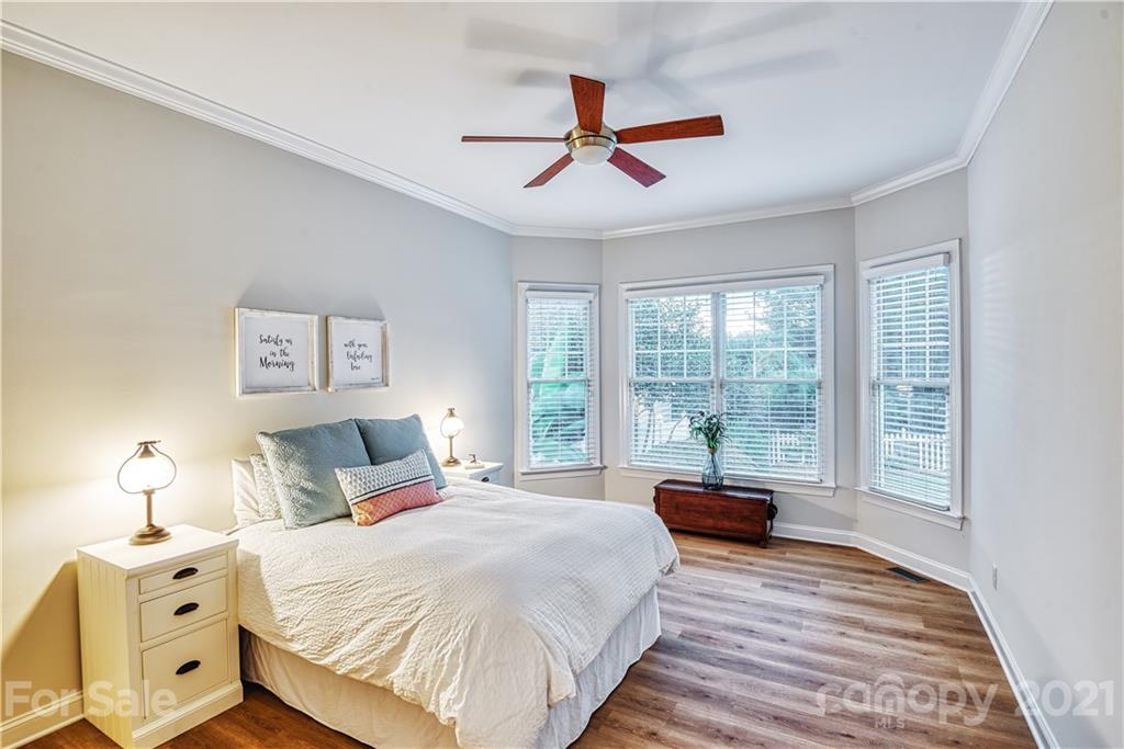 1380 Barnett Woods Fort Mill, SC 29708 - Photo 18 of 31 a bedroom with a large bed and a window