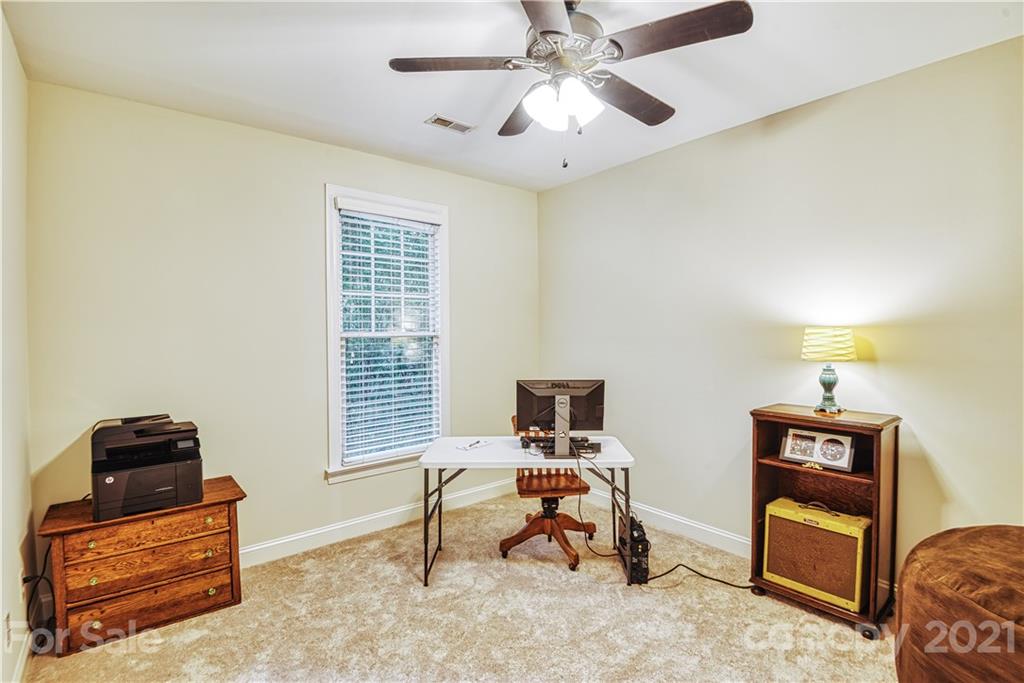 1380 Barnett Woods Fort Mill, SC 29708 - Photo 27 of 31 a view of a workspace with furniture and a window