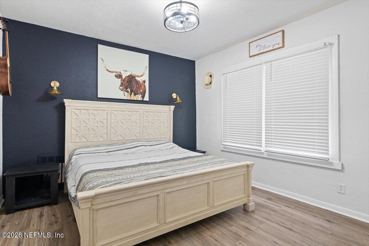 45116 Kilpatrick Road Callahan, FL 32011 - Photo 18 of 41 a bedroom with a bed and a window