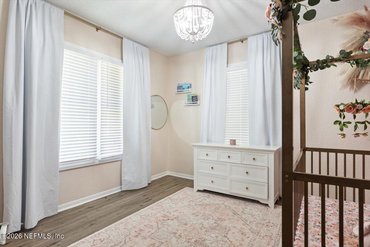 45116 Kilpatrick Road Callahan, FL 32011 - Photo 24 of 41 a view of a bedroom with windows