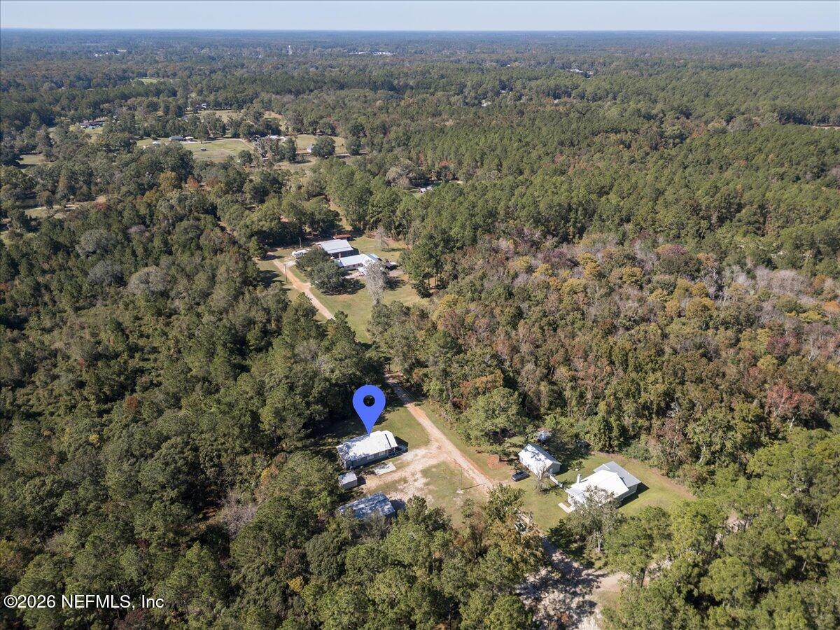 45116 Kilpatrick Road Callahan, FL 32011 - Photo 38 of 41 an aerial view of a house with a yard