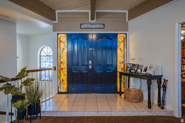 980 Cactus Circle St. George, UT 84790 - Photo 19 of 77 Entrance foyer with tile patterned flooring and wood ceiling