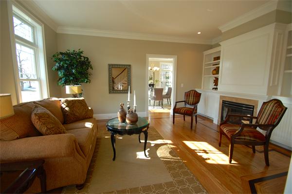 27 Leewood Road Wellesley, MA 02482 - Photo 3 of 17 a living room with furniture and a fireplace