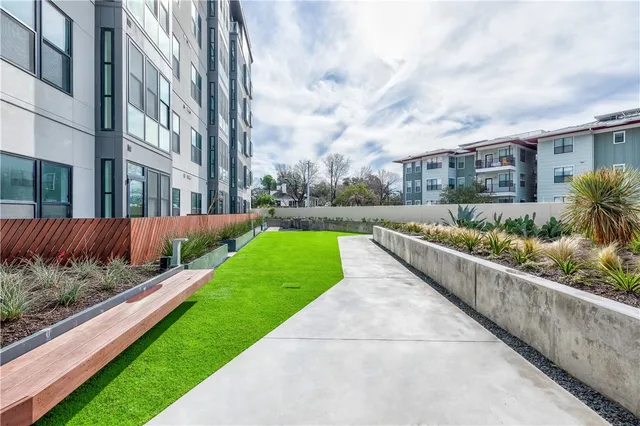 a view of building with yard