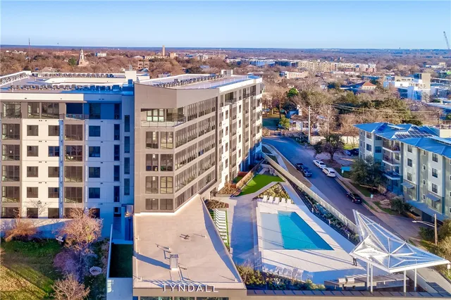 a view of a city with tall buildings