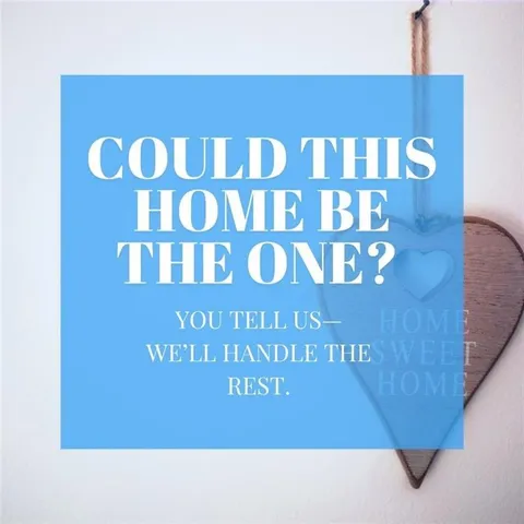 a view of a building next to a yard