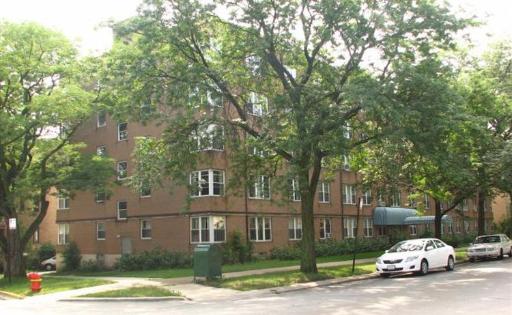 7333 North Ridge Boulevard, Unit 305 Chicago, IL 60645 - Photo 1 of 1 a car parked in front of a white house