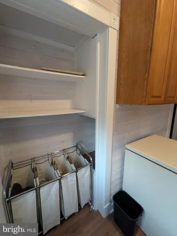 a bedroom with table and chair