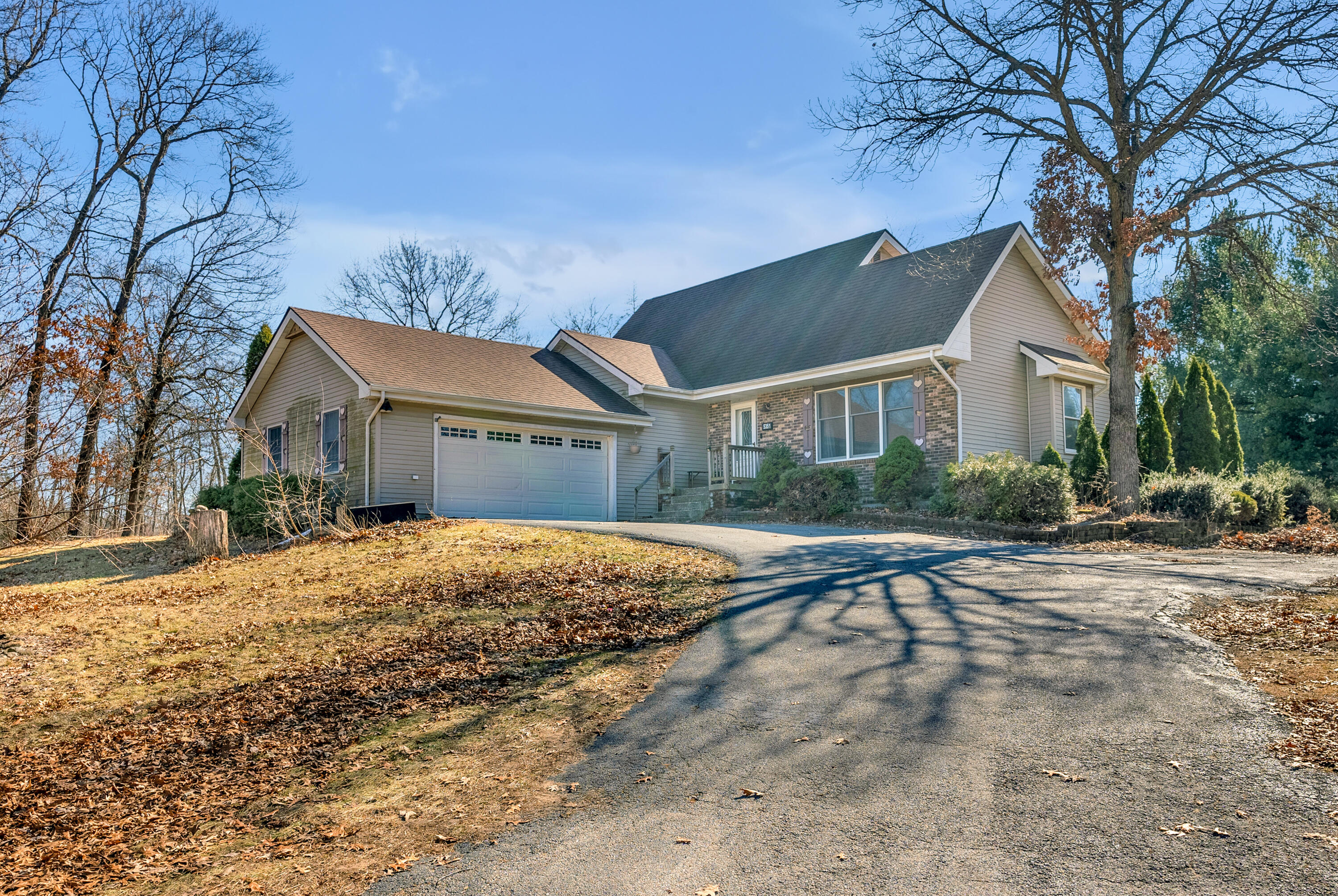a house with yard in front of it