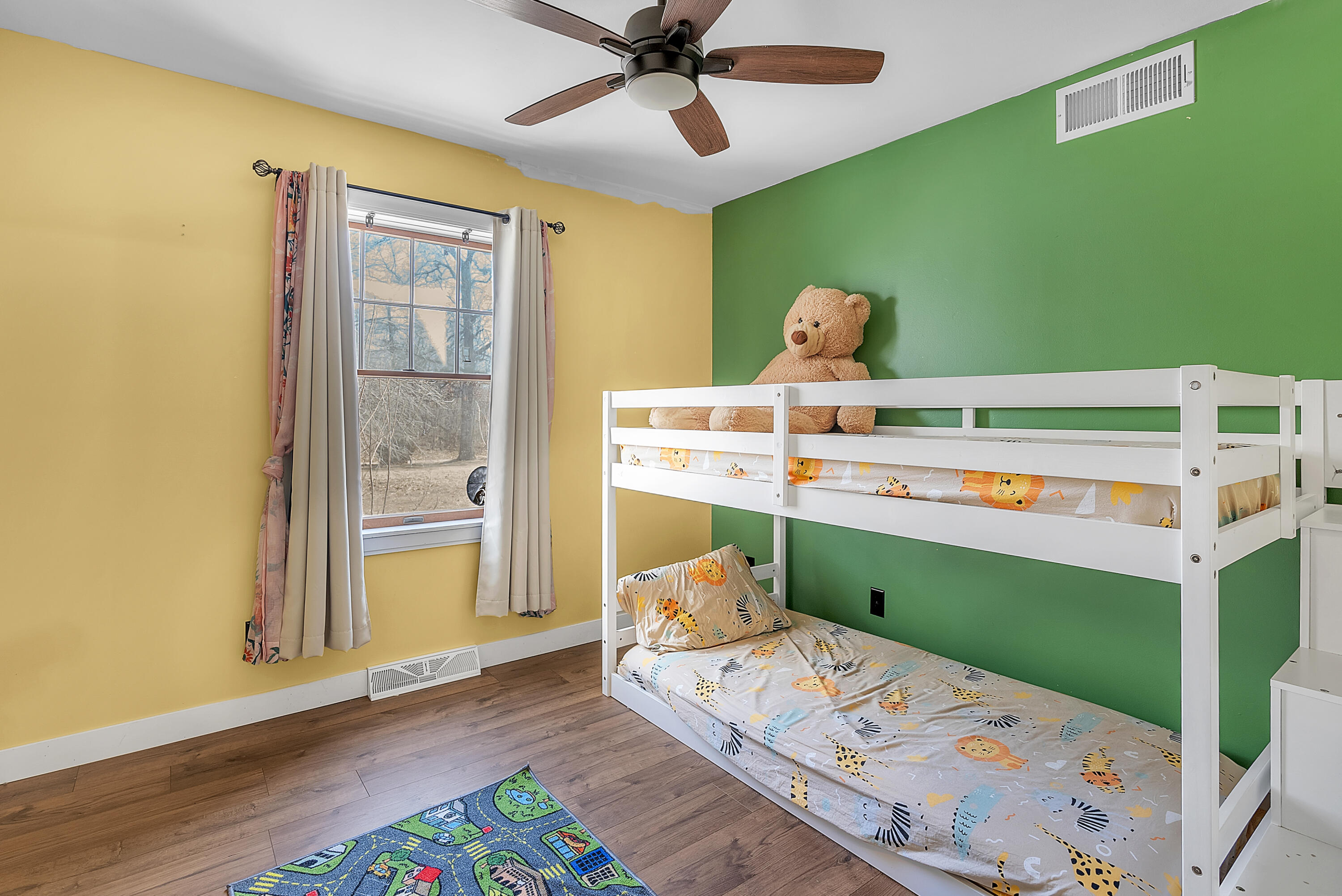 5351 East Honor Avenue Demotte, IN 46310 - Photo 14 of 31 a bedroom with a bed and a window