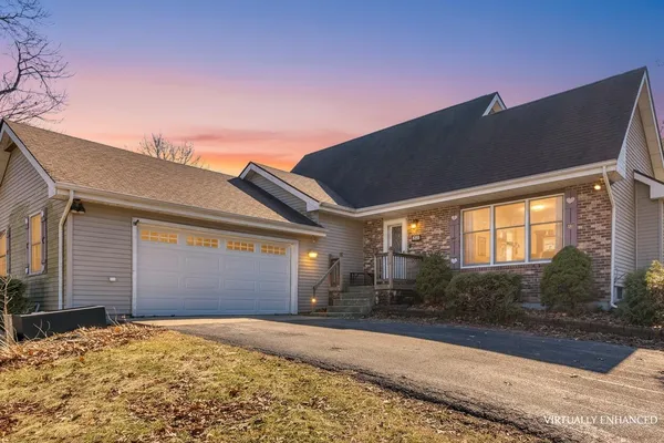 a bedroom with a bed and flat screen tv