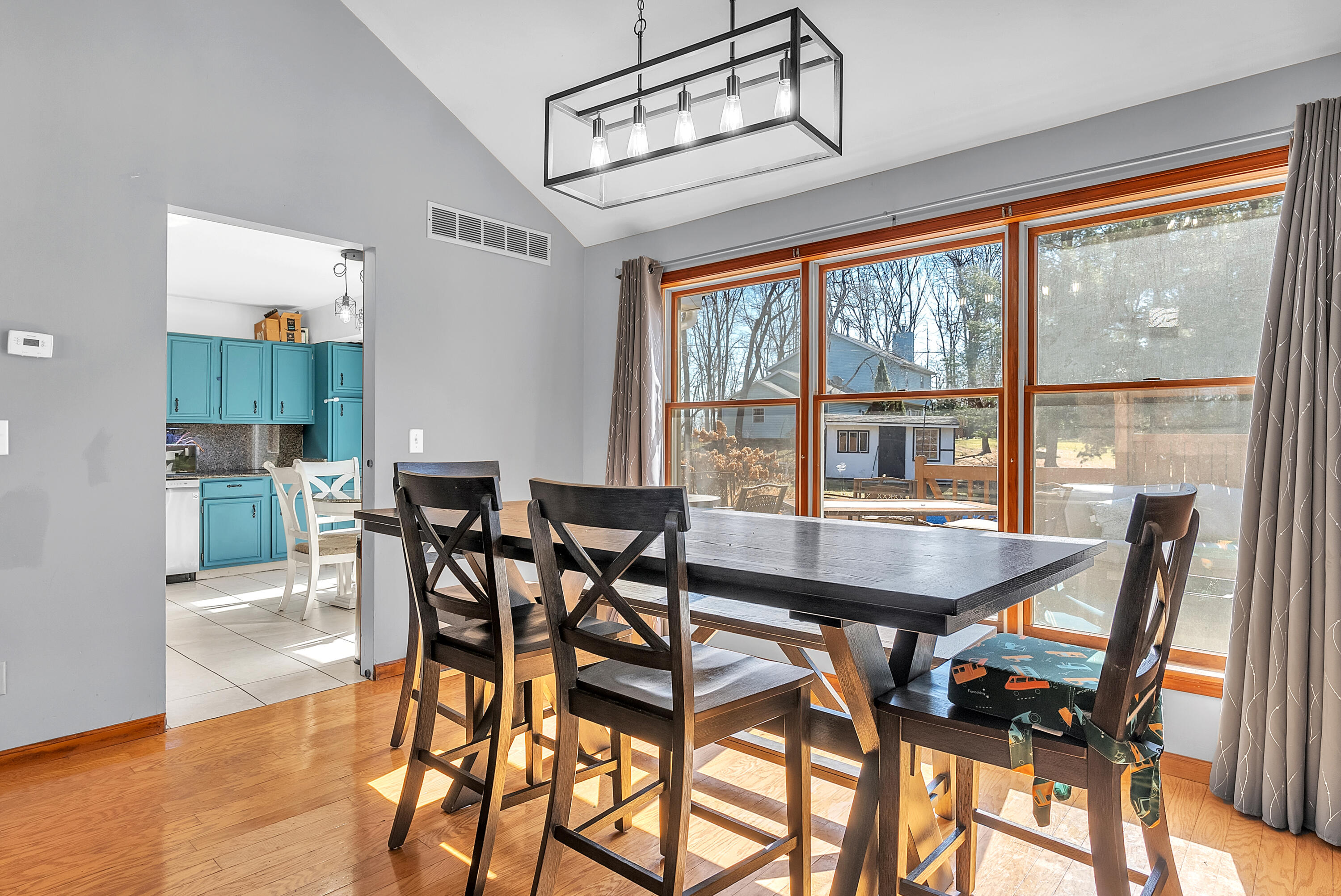 5351 East Honor Avenue Demotte, IN 46310 - Photo 8 of 31 a view of a dining room with furniture and a window