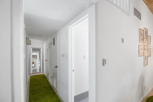 a bathroom with a sink a vanity and a bathtub