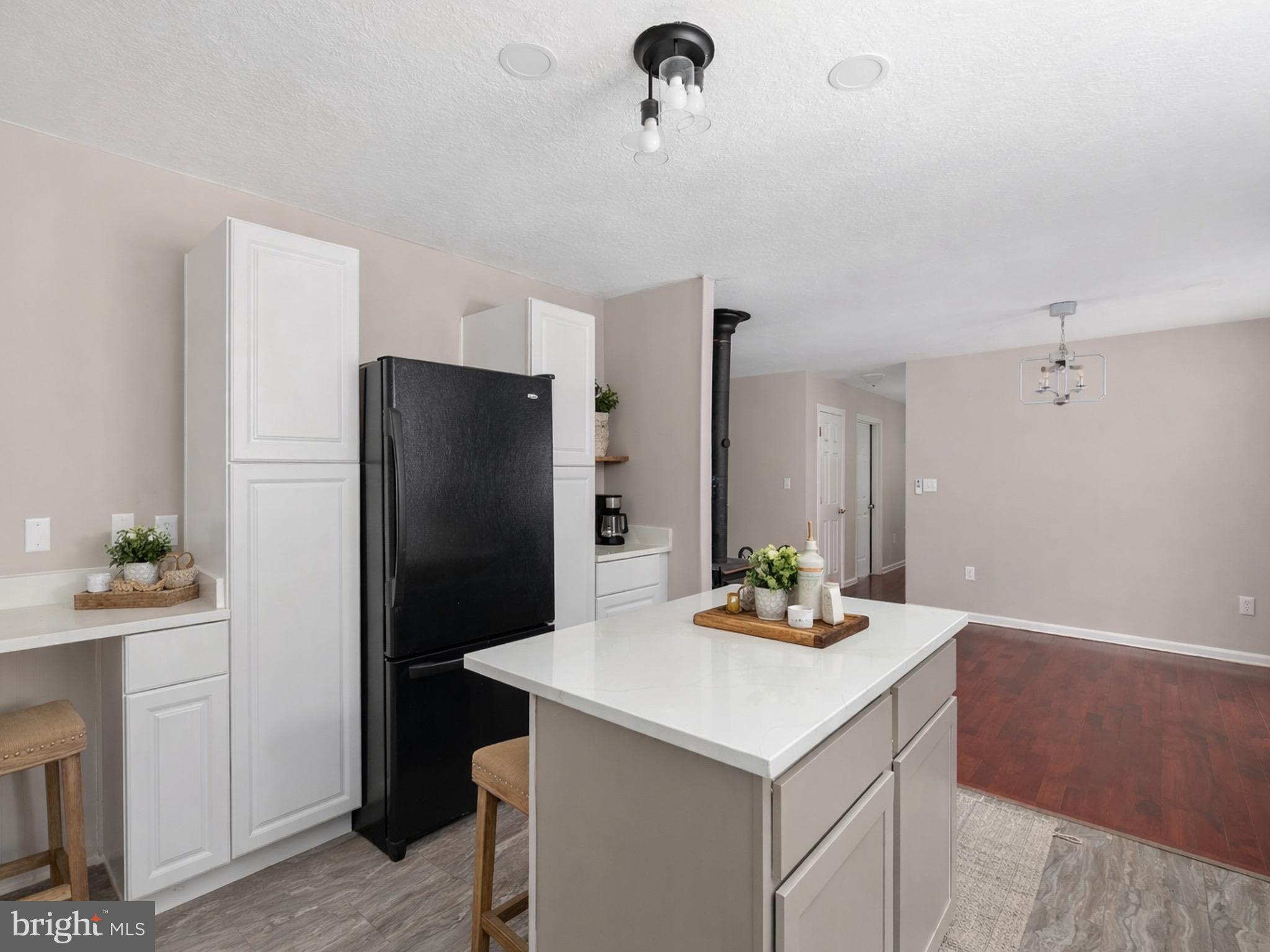 503 Pomeroy Road Front Royal, VA 22630 - Photo 11 of 41 a kitchen with a refrigerator and countertop