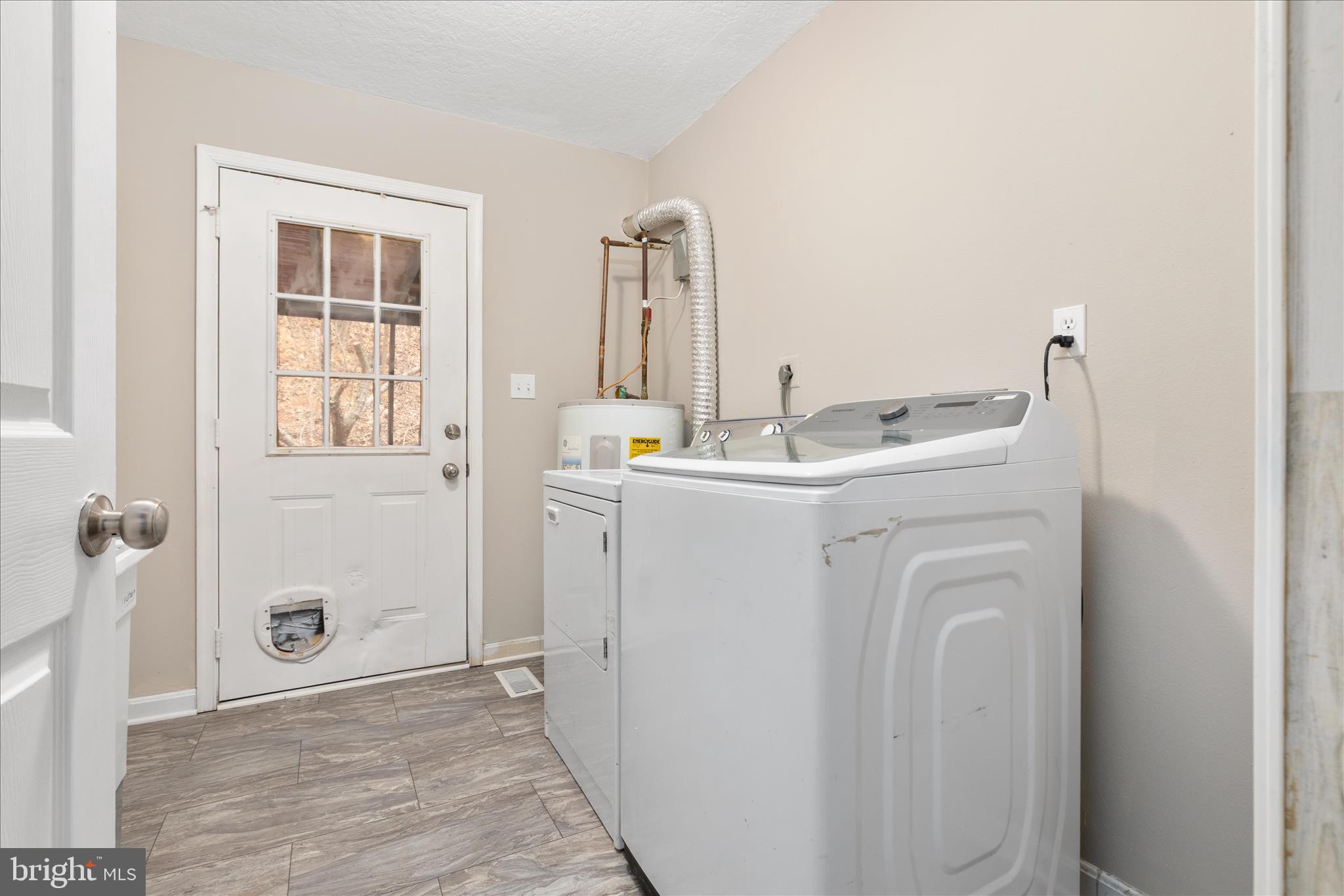503 Pomeroy Road Front Royal, VA 22630 - Photo 13 of 41 a utility room with closet dryer and washer