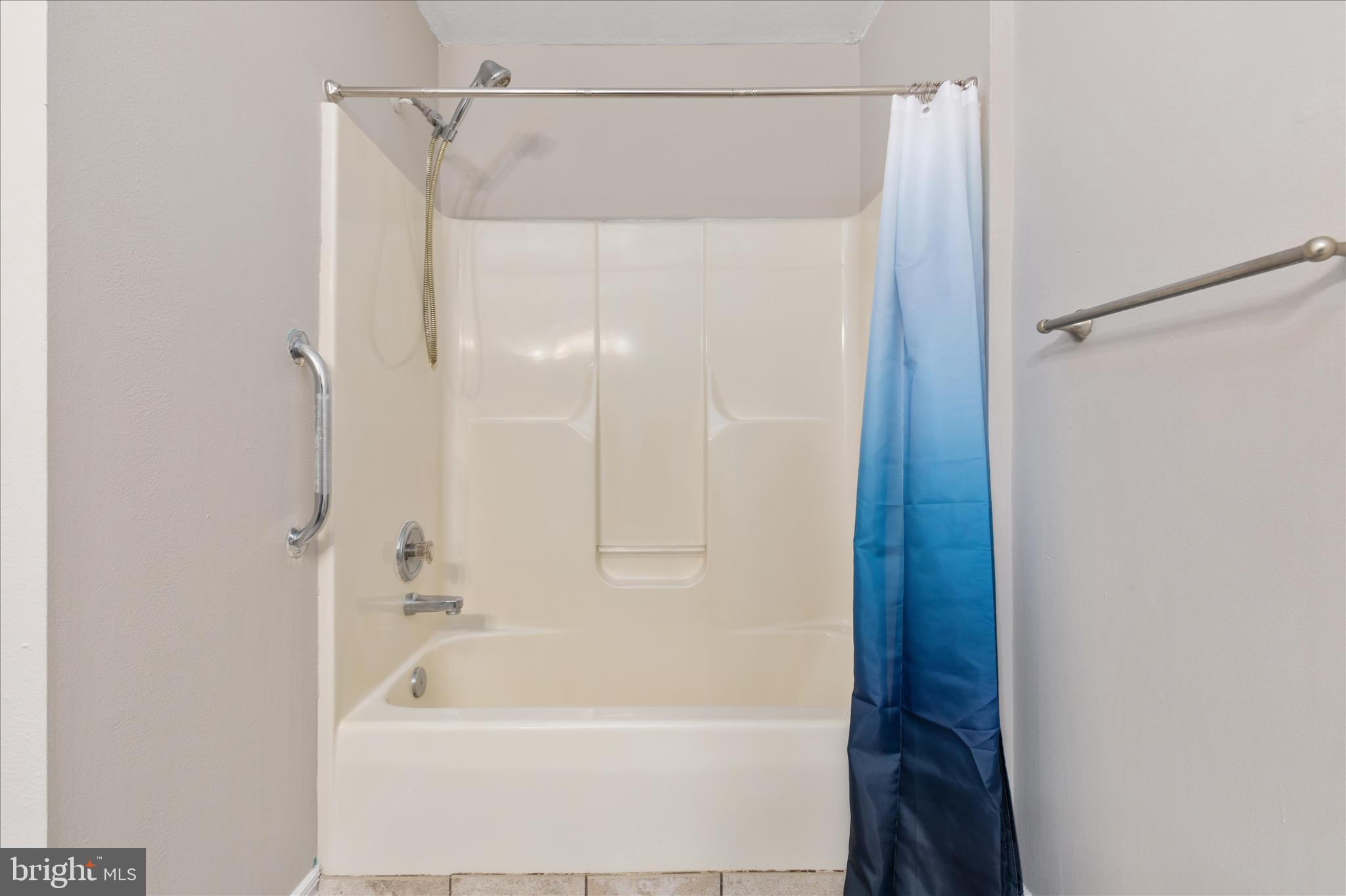 503 Pomeroy Road Front Royal, VA 22630 - Photo 15 of 41 a bathroom with a bathtub and a shower