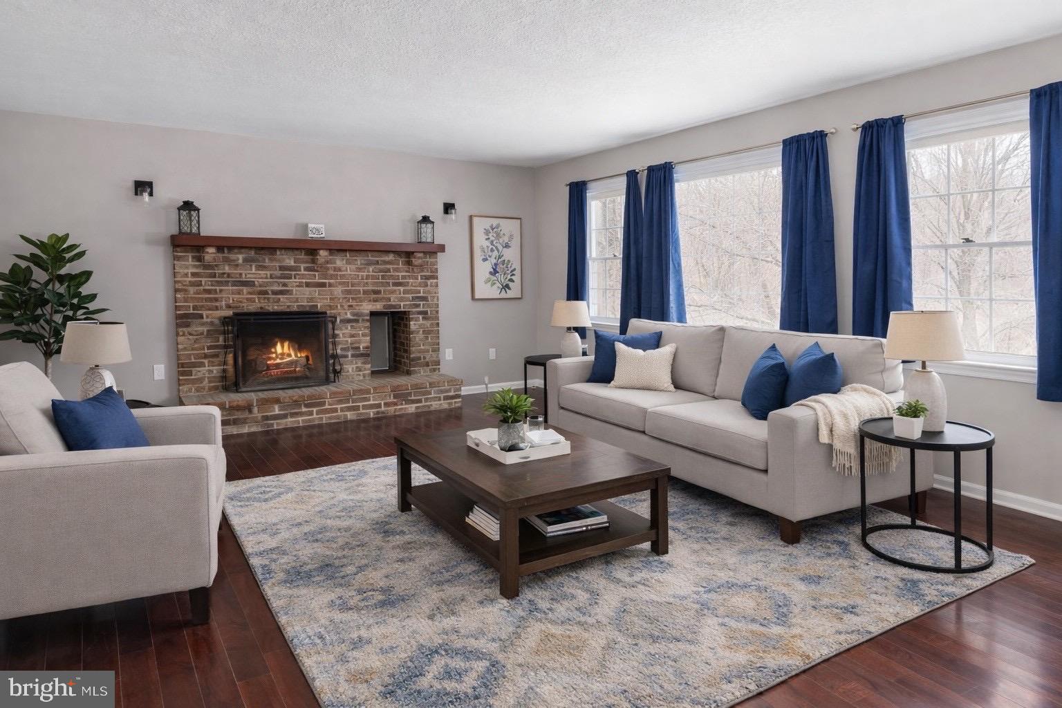 503 Pomeroy Road Front Royal, VA 22630 - Photo 5 of 41 a living room with furniture and a fireplace