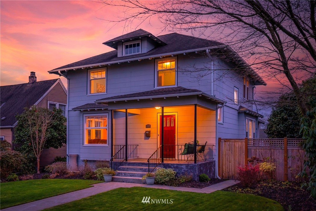 1509 Rucker Avenue Everett, WA 98201 - Photo 1 of 39 a front view of a house with garden