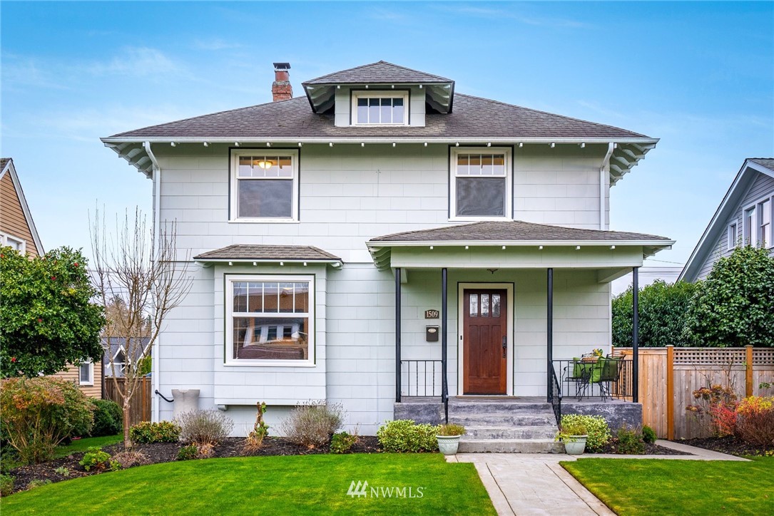 1509 Rucker Avenue Everett, WA 98201 - Photo 2 of 39 a front view of a house with garden