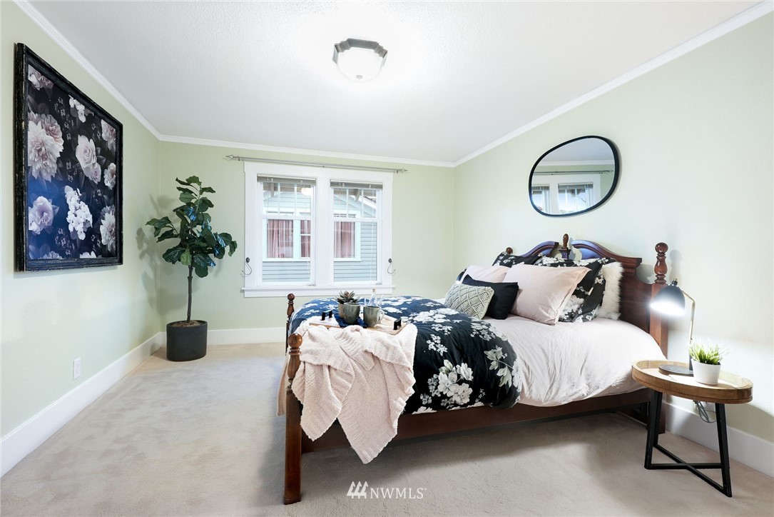 1509 Rucker Avenue Everett, WA 98201 - Photo 17 of 39 a bedroom with bed and a window