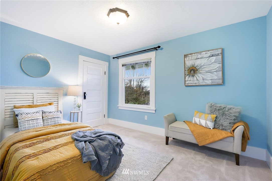 1509 Rucker Avenue Everett, WA 98201 - Photo 18 of 39 a bedroom with a bed and window