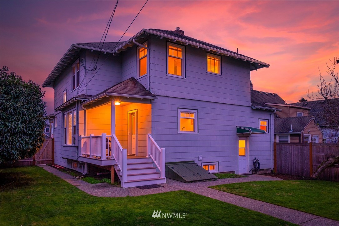 1509 Rucker Avenue Everett, WA 98201 - Photo 26 of 39 a front view of a house with a garden