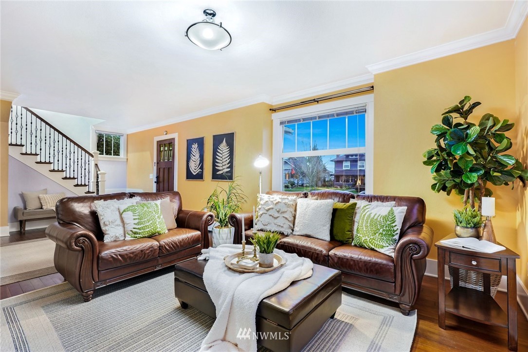 1509 Rucker Avenue Everett, WA 98201 - Photo 5 of 39 a living room with furniture and a potted plant