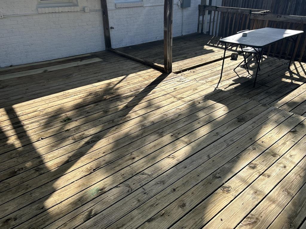 6318 Belgrade Avenue Dallas, TX 75227 - Photo 20 of 23 a view of balcony with a table and chairs
