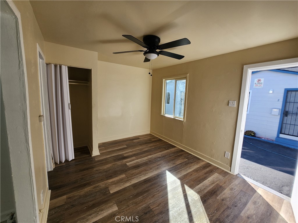 3717 West Imperial Highway, Unit 7 Inglewood, CA 90303 - Photo 5 of 6 wooden floor in an empty room with a window