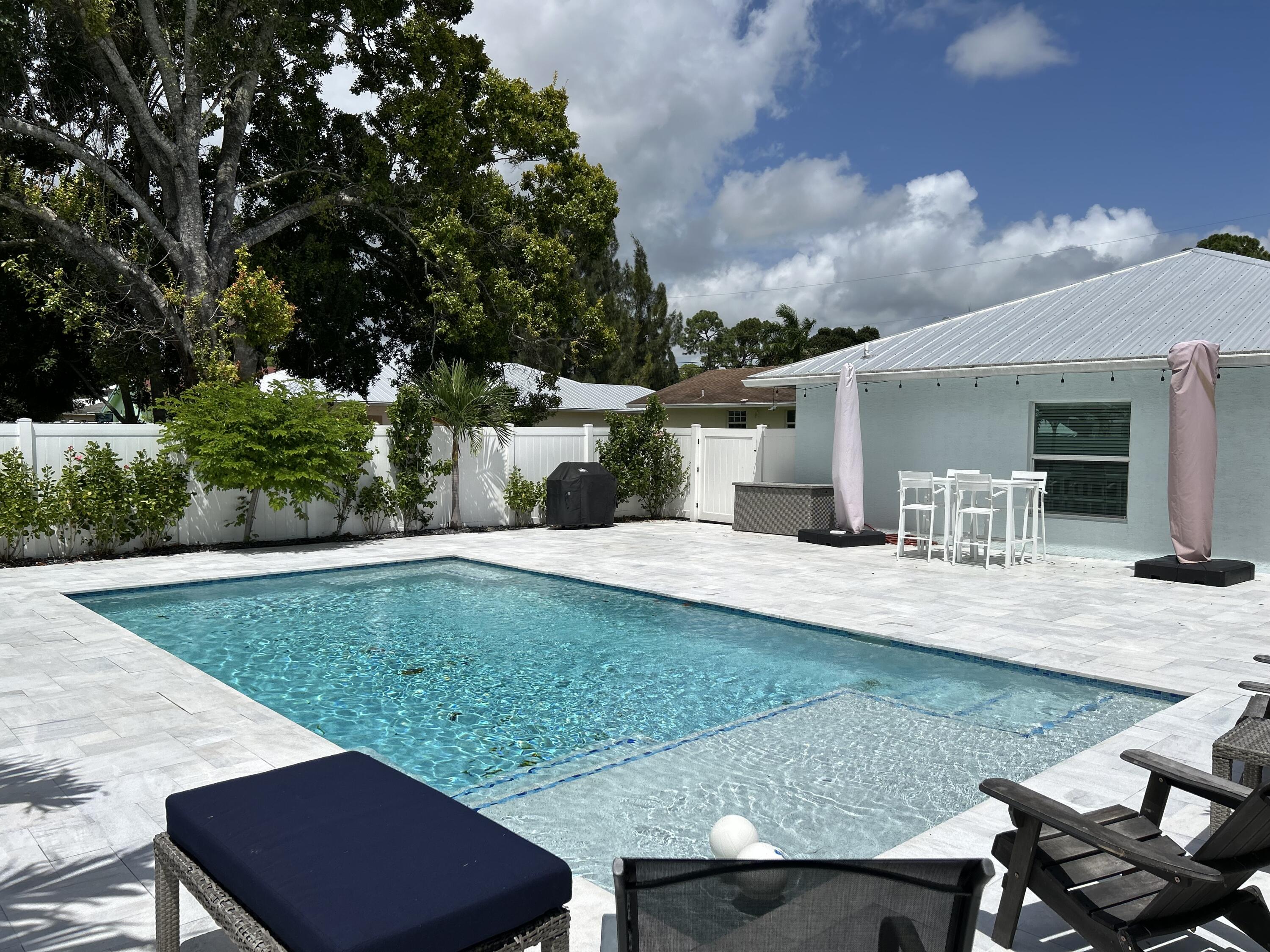 6882 3rd Street Limestone Creek, FL 33458 - Photo 15 of 17 a view of a backyard