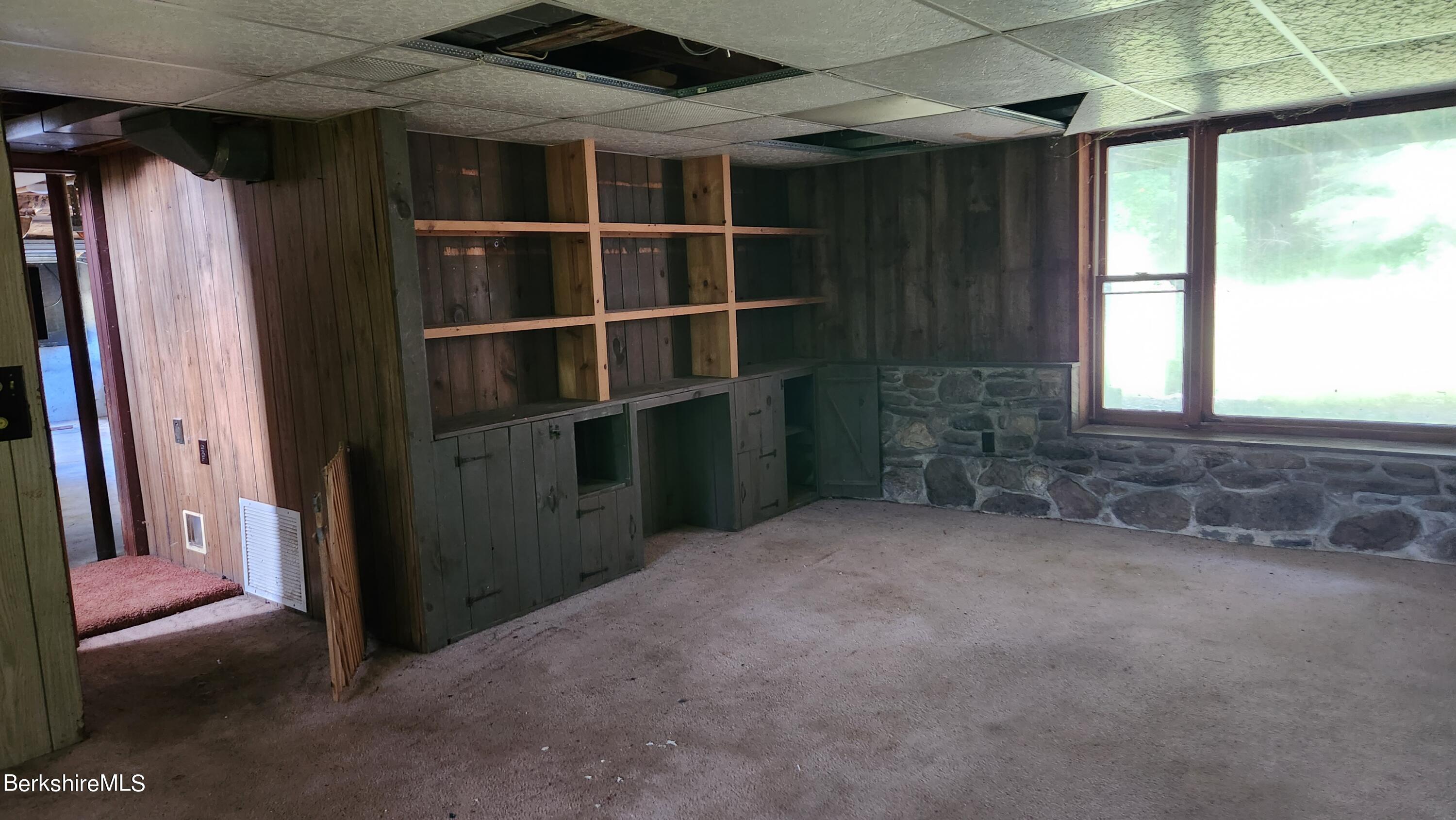 1156 Monterey Road Otis, MA 01253 - Photo 8 of 11 a view of an empty room with a window