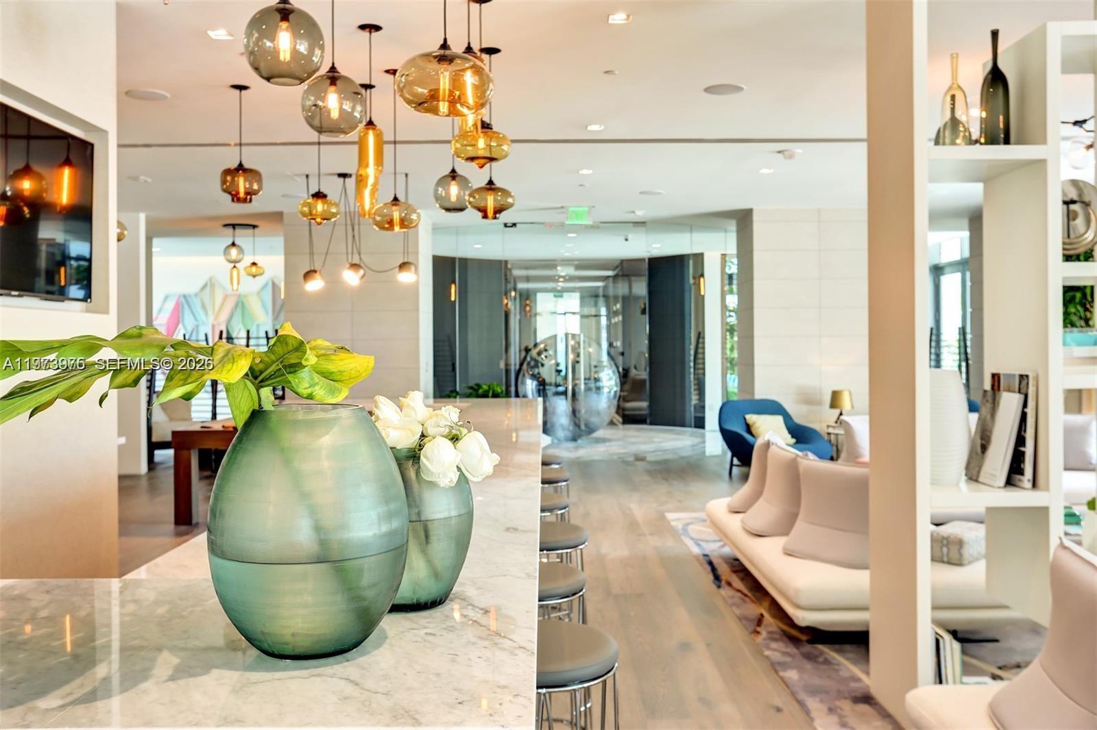 650 Northeast 32nd Street, Unit 2007 Miami, FL 33137 - Photo 26 of 44 a vase of flowers sitting on a table