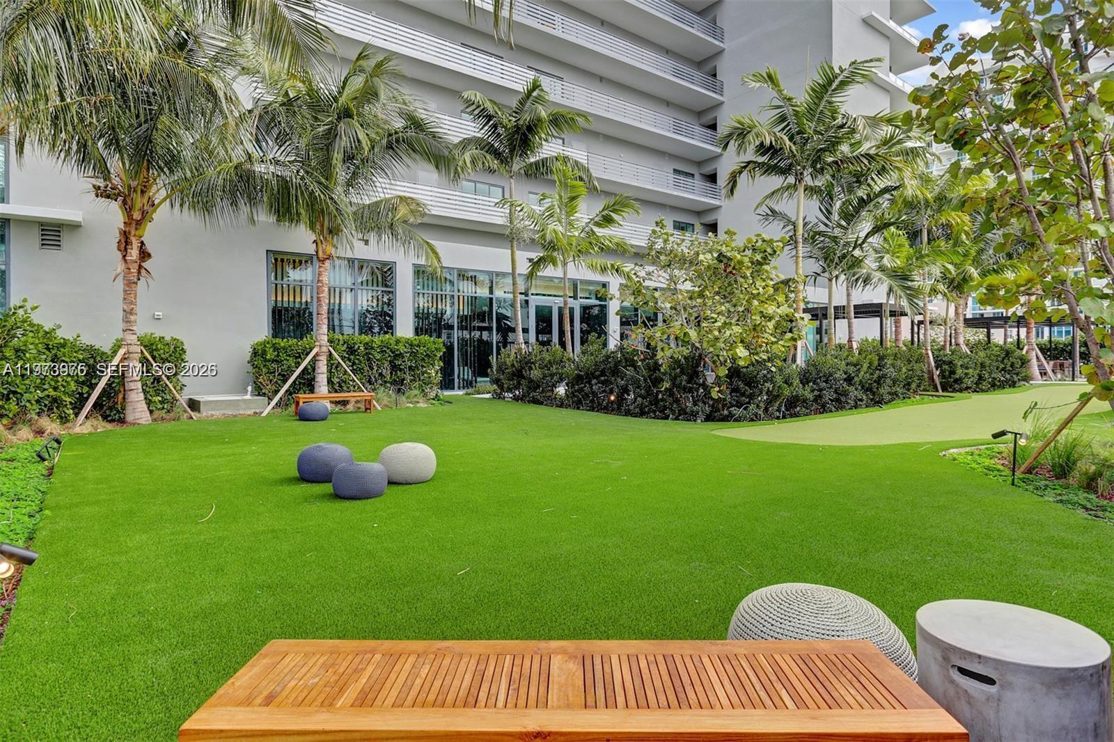 650 Northeast 32nd Street, Unit 2007 Miami, FL 33137 - Photo 36 of 44 a view of an house with backyard and slide