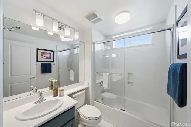 a bedroom with furniture and a couch