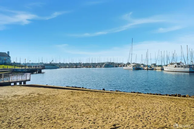 an aerial view of a house with yard