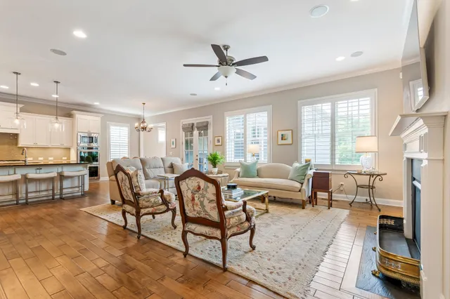 a en suite bathroom with a granite countertop sink and a mirror