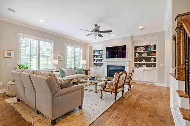 a bathroom with a sink a mirror a toilet and a shower