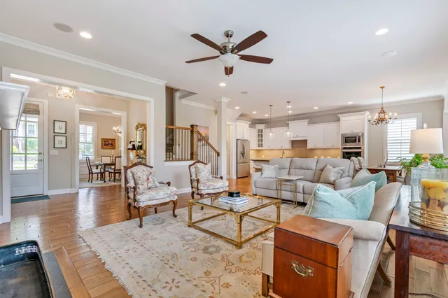 an aerial view of multiple houses with yard