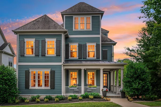 a living room with furniture fireplace and flat screen tv