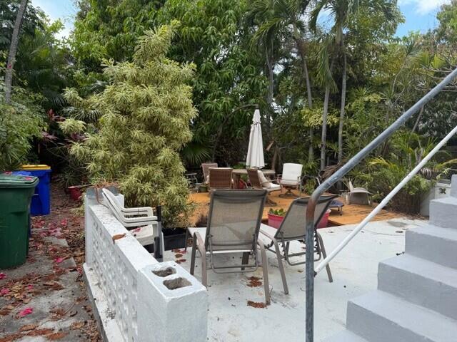 812 Thomas Street Key West, FL 33040 - Photo 5 of 12 a view of an outdoor sitting area with furniture