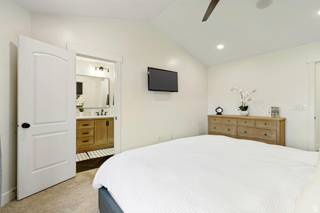 983 West 1550th Street South Springville, UT 84663 - Photo 24 of 43 Vaulted ceiling bedroom with light-colored carpet flooring, recessed lighting and private bathroom.