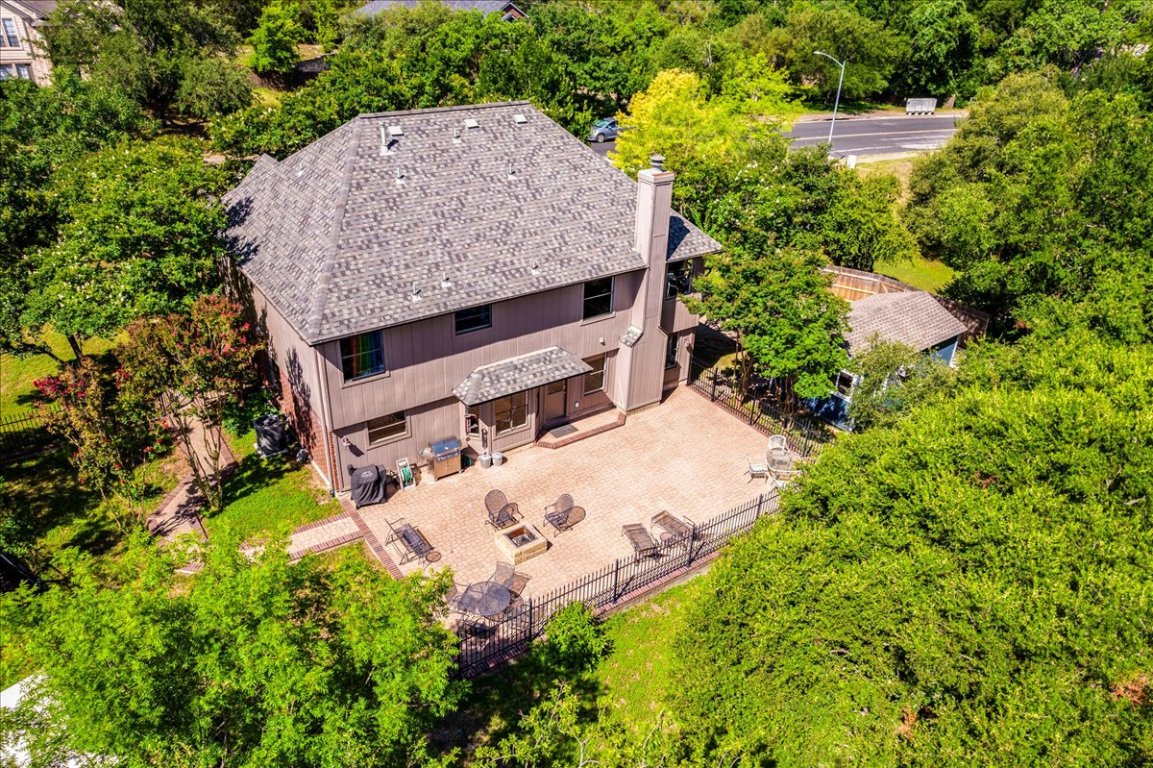 Aerial view of the sprawling back patio at the back of this gorgeous home!