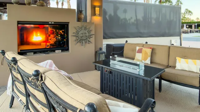 a view of a chairs and table on the terrace